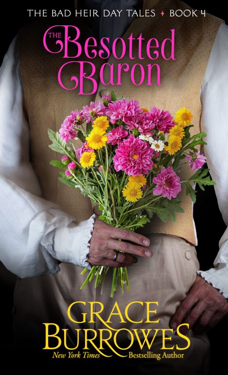 The cover image for The Besotted Baron by Grace Burrowes. A handsome baron in regency attire holds a bright bouquet of flowers over his chest in his right hand.