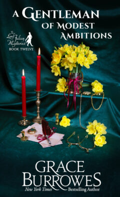 The cover for "A Gentleman of Modest Ambitions", Book 12 in the Lord Julian Mysteries series, by Grace Burrowes. A Golden cup filled with daffodils sits on an emerald green velvet background. To its left are two tall, red, lit candles in gold candlestick holders an an assortment of gold pocket watches, gold horse riding spurs, and a letter with an elaborate feather quill laid on top of it.